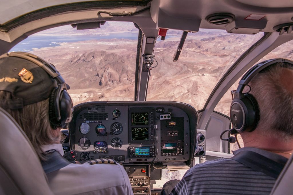 Pilots flying a small plane. Executing on a strategy. 